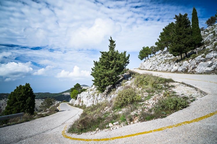 Serpentine road in the mountains on the island of Corfu - Greece